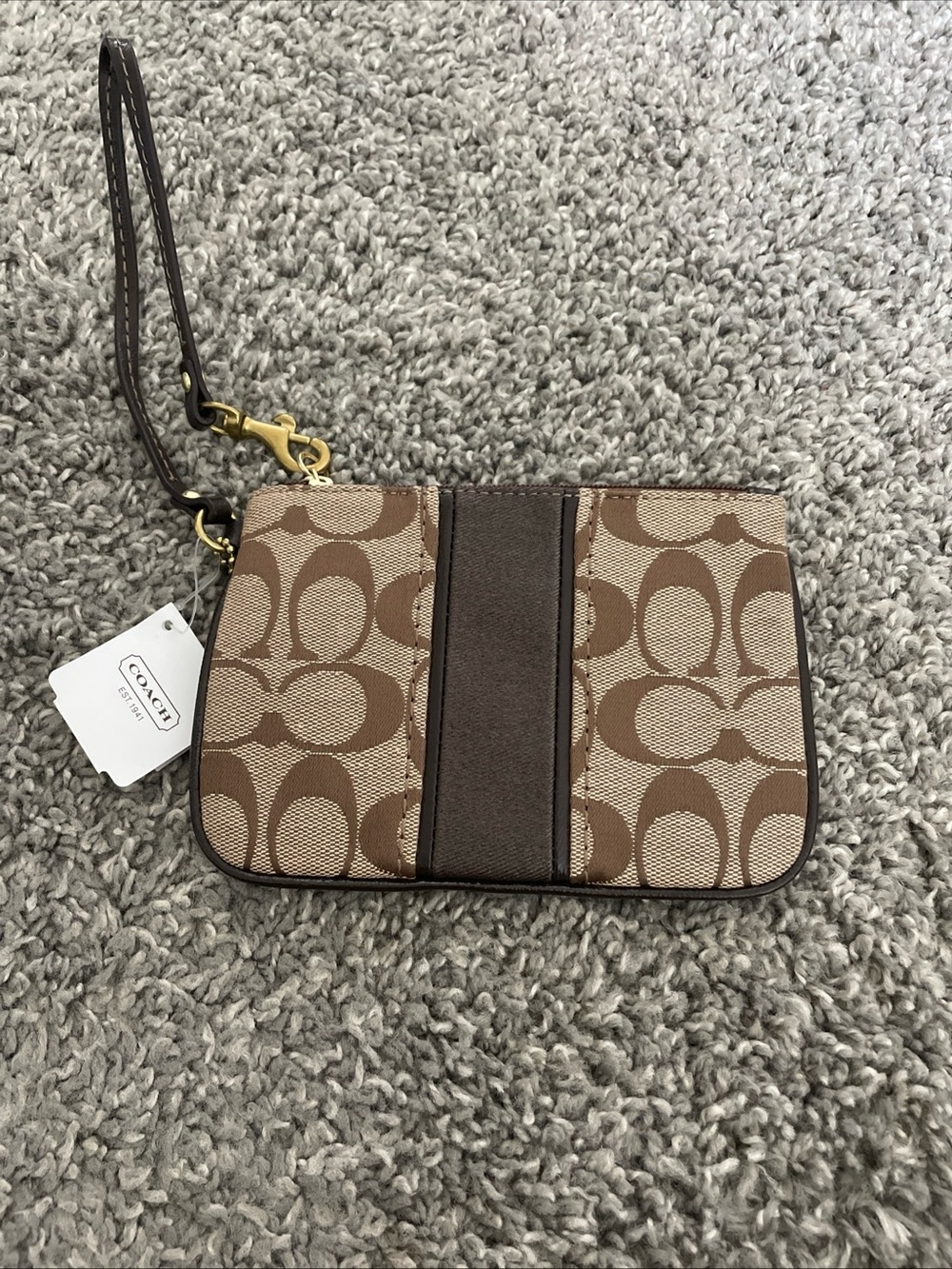 Coach classic wristlet with Brown Logo